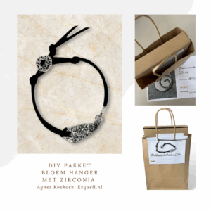 DIY pakket Stoere Armband met zilveren ornamentje en zilveren sluiting.